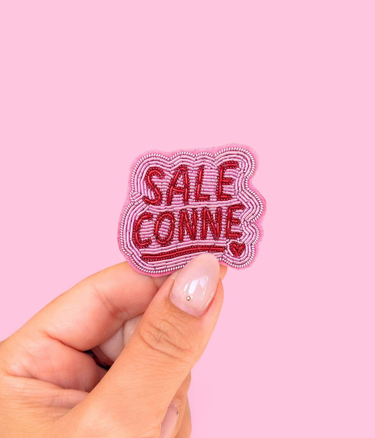 Broche Sale conne
