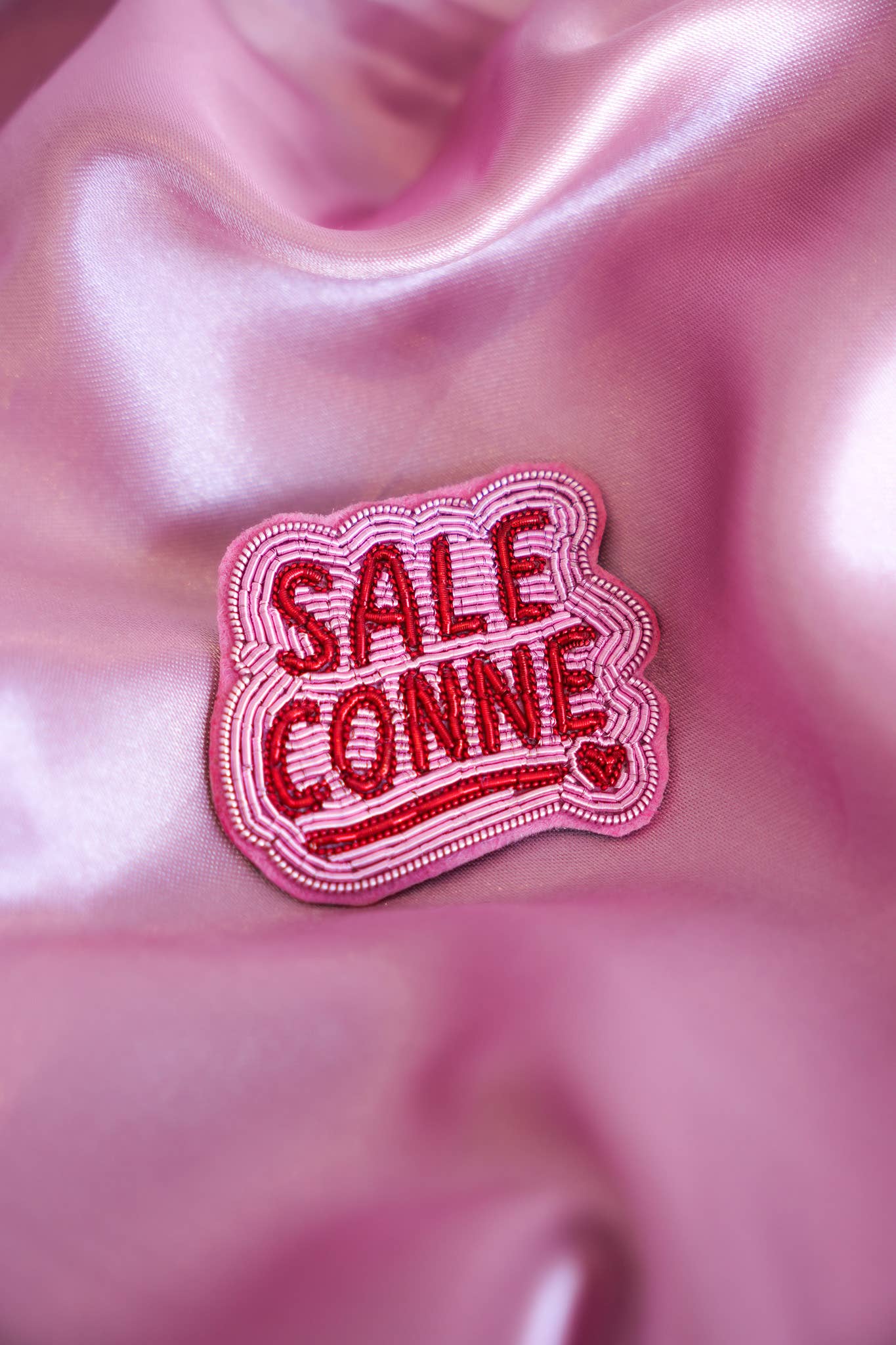 Broche Sale conne