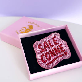 Broche Sale conne