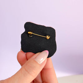 Broche Sale conne