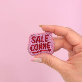 Broche Sale conne