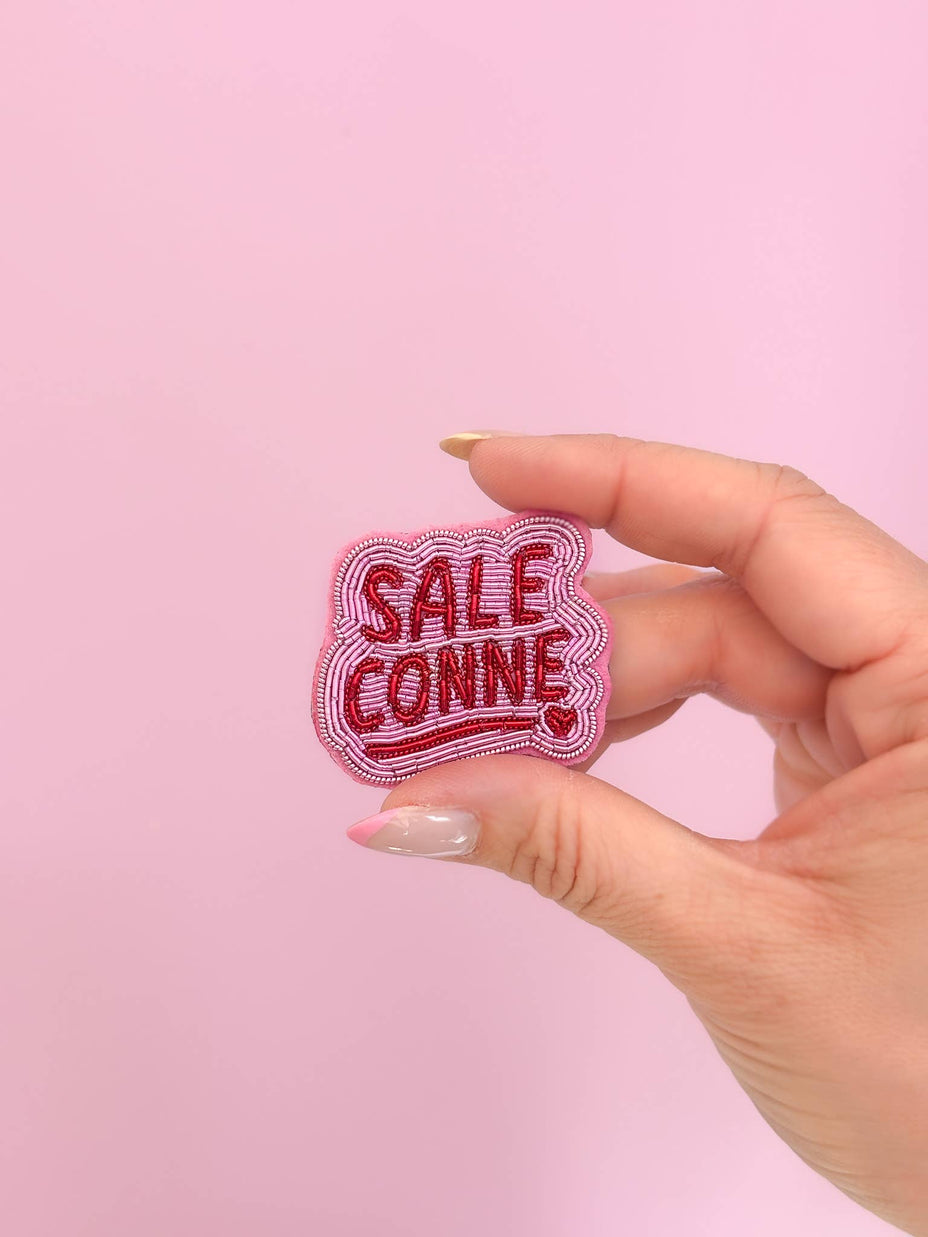 Broche Sale conne