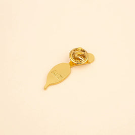 Pin's émaillé Radis à paillettes