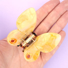 Pince papillon jaune