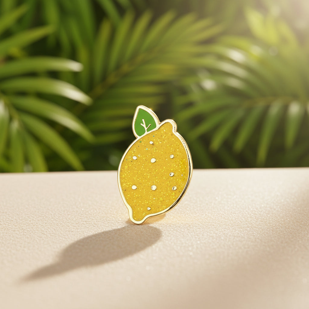 Pin's émaillé Citron à paillettes