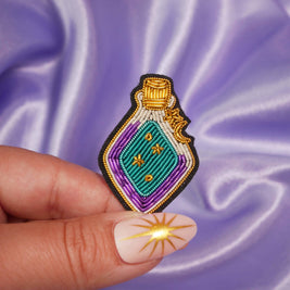 Broche Potion Magique