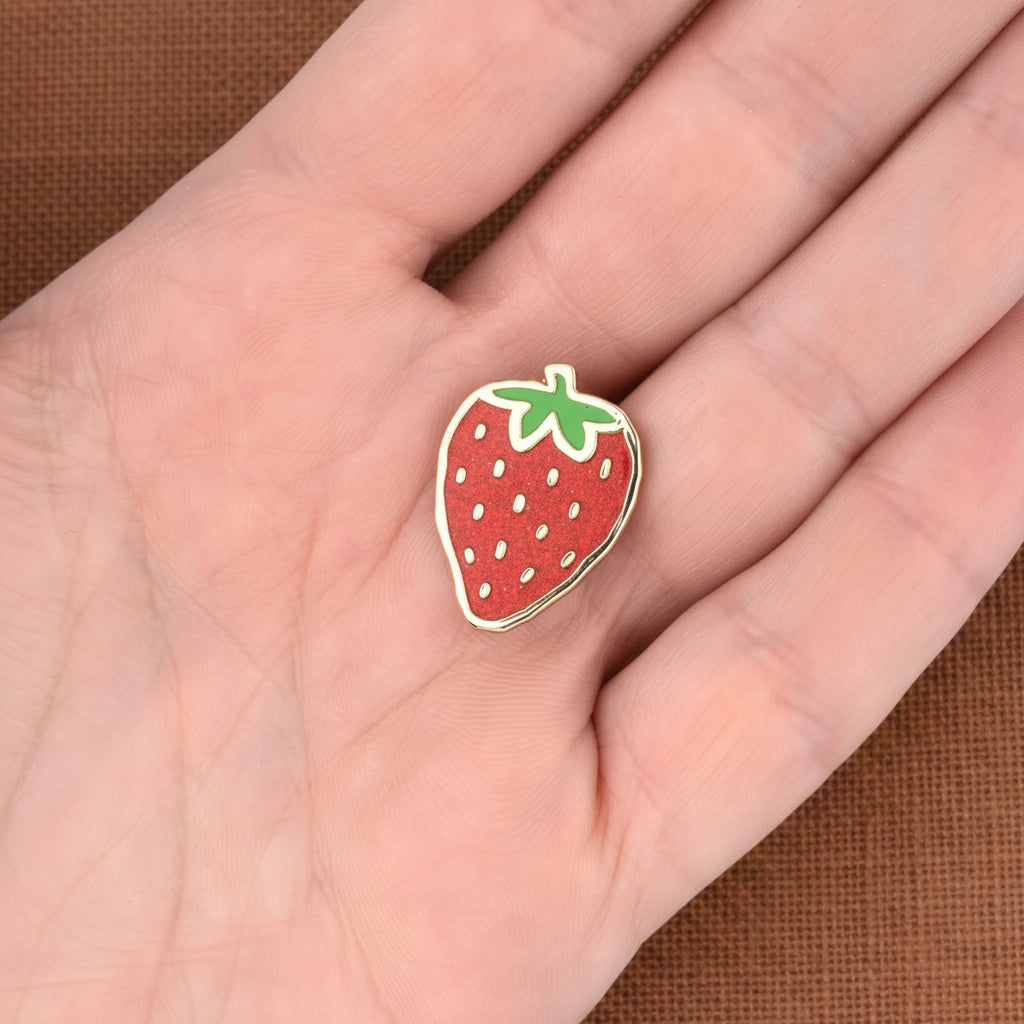 Pin's émaillé Fraise à paillettes